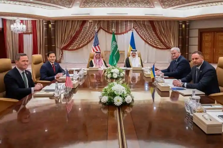Ukrainian and Russian officials meet for peace talks in a formal setting. Channel i News - চ্যানেল আই নিউজ