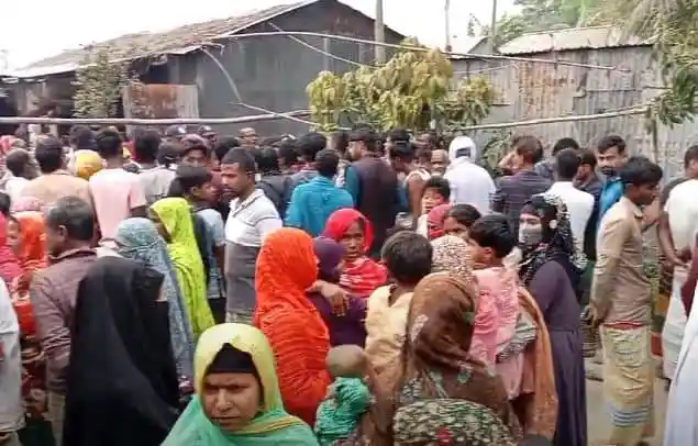 Bangladeshi crowd gathers at a crime scene after a murder incident. Channel i News - চ্যানেল আই নিউজ