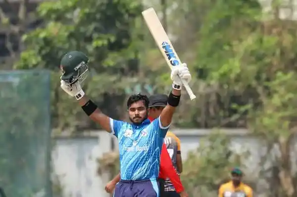 Cricket player celebrating after scoring a century in a match. Channel i News - চ্যানেল আই নিউজ