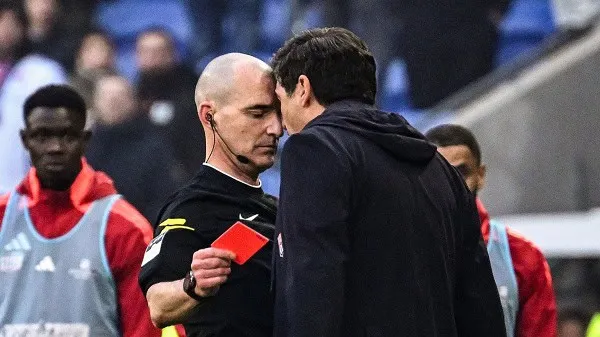 Referee and coach in heated discussion during football match. Channel i News - চ্যানেল আই নিউজ