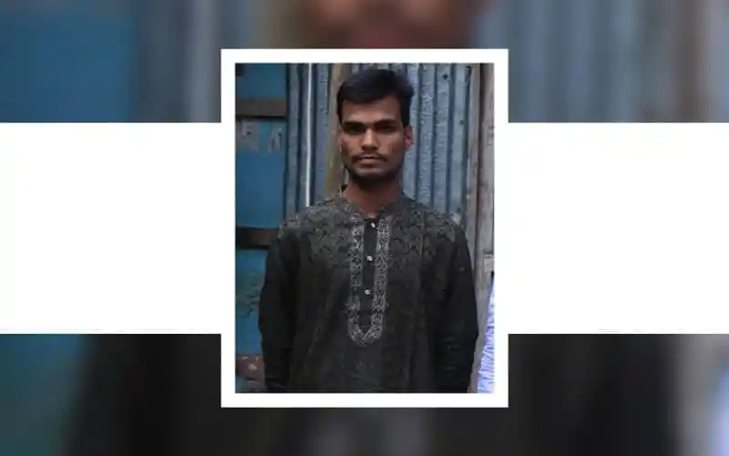 শহীদ ফেলানীর ভাইয়ের ছবি, বাংলাদেশি যুবক, কালো পাঞ্জাবি পরিহিত. Channel i News - চ্যানেল আই নিউজ
