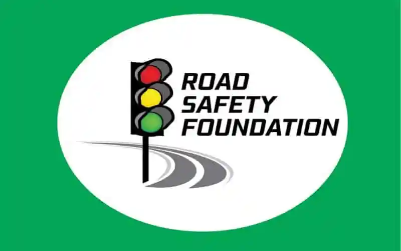 Road Safety Foundation logo with traffic light and road graphic. Channel i News - চ্যানেল আই নিউজ