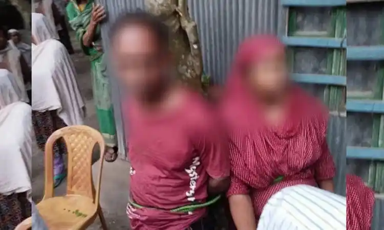নির্যাতনের শিকার দুই ব্যক্তি, একজন পুরুষ ও একজন মহিলা, বেঁধে রাখা হয়েছে. Channel i News - চ্যানেল আই নিউজ