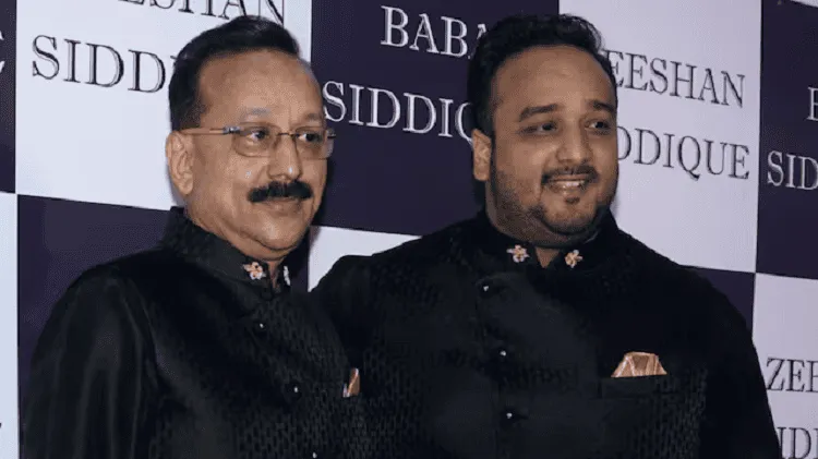 দুই পুরুষ একসঙ্গে দাঁড়িয়ে, পাঞ্জাবি পরিহিত, হাসিমুখে. Channel i News - চ্যানেল আই নিউজ