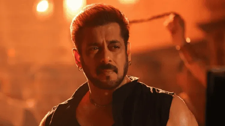 সালমান খান সিনেমার দৃশ্যে intense expression, সিনেমার সেটে আলো ঝলমলে. Channel i News - চ্যানেল আই নিউজ