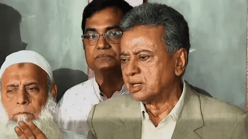 আমীর খসরু বক্তৃতা দিচ্ছেন, পাশে অন্য ব্যক্তি আছেন. Channel i News - চ্যানেল আই নিউজ