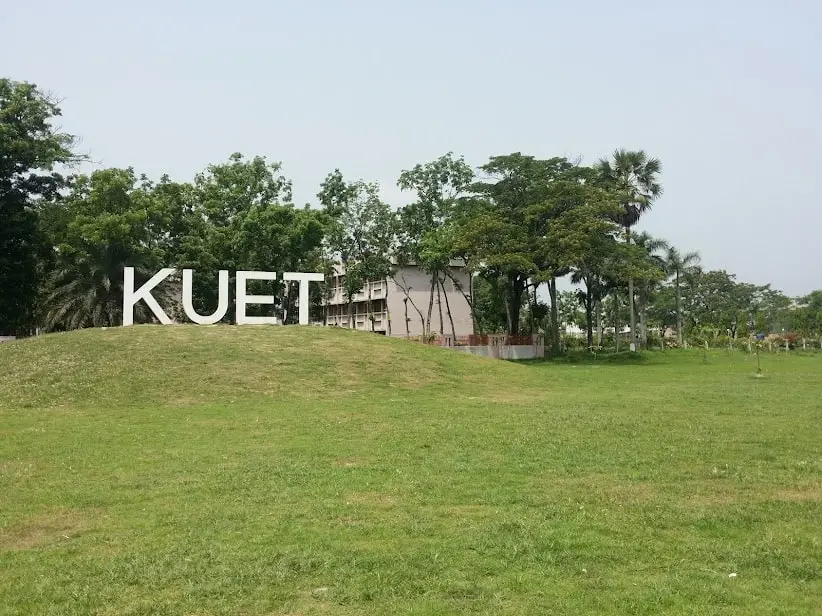 KUET campus entrance with large sign and greenery in Bangladesh. Channel i News - চ্যানেল আই নিউজ