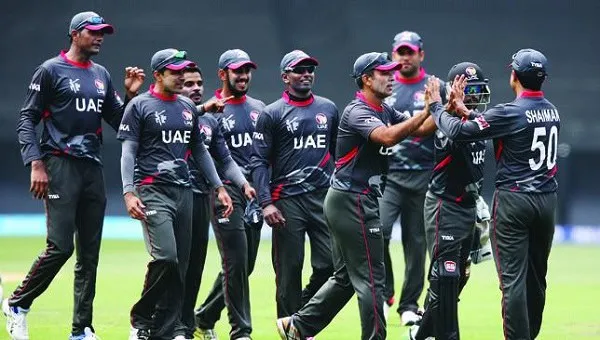 সংঘটিত ক্রিকেট ম্যাচের খেলোয়াড়রা মাঠে একসঙ্গে উদযাপন করছে. Channel i News - চ্যানেল আই নিউজ