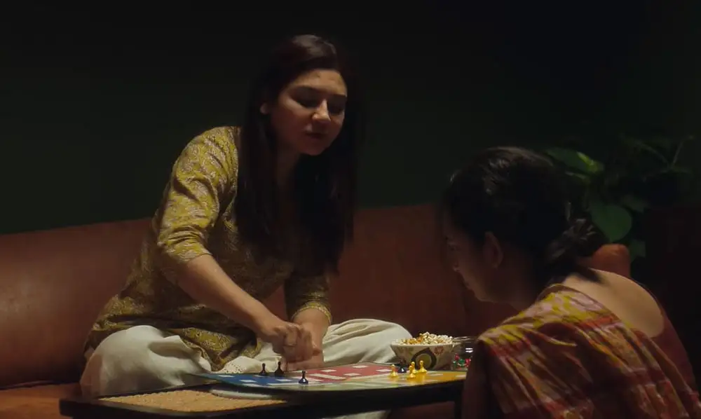 দুই নারী একসঙ্গে বসে আলোচনায় ব্যস্ত, একটি টেবিলের পাশে. Channel i News - চ্যানেল আই নিউজ