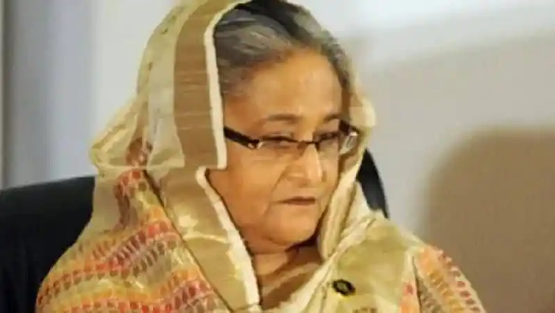 শেখ হাসিনা অভিযোগের মধ্যে মনোযোগীভাবে বসে আছেন. Channel i News - চ্যানেল আই নিউজ