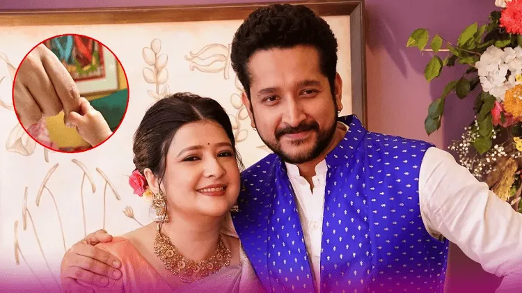 পরমব্রত চট্টোপাধ্যায় ও তার স্ত্রী পোজ দিচ্ছেন, পিতৃত্বের দায়িত্ব নিয়ে আলোচনা।. Channel i News - চ্যানেল আই নিউজ