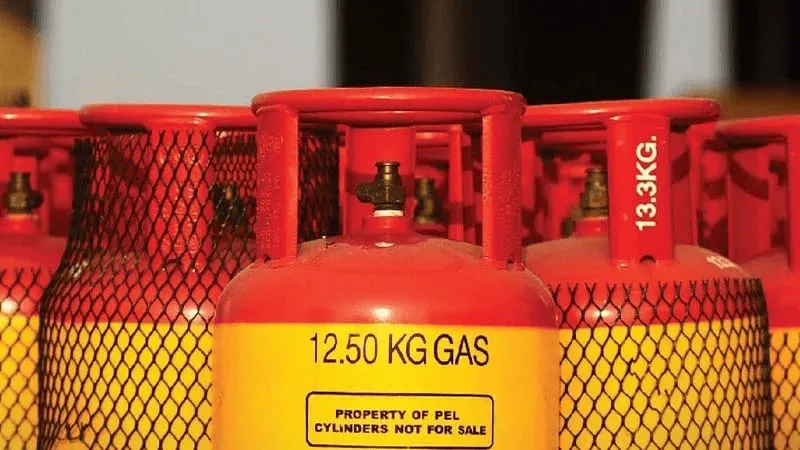 12.50 KG LPG gas cylinder with red and yellow design. Channel i News - চ্যানেল আই নিউজ