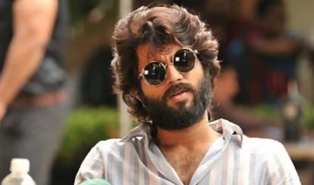 বিজয়ের চুল ও গোঁফসহ মুখের ছবি, sunglasses পরা. Channel i News - চ্যানেল আই নিউজ