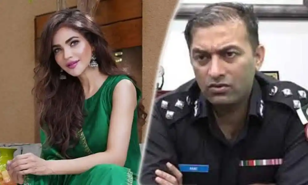 চ্যানেল আই অনলাইন সংবাদে দুই ব্যক্তির ছবি, একজন নারী ও একজন পুলিশ কর্মকর্তা. Channel i News - চ্যানেল আই নিউজ