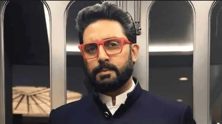 নির্বাচনী পোশাক পরিহিত একজন পুরুষের ছবি, চোখে রঙিন চশমা পরা. Channel i News - চ্যানেল আই নিউজ