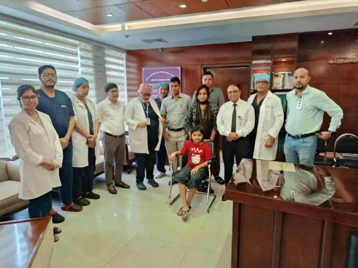Hospital visit with medical staff and a young girl in a wheelchair. Channel i News - চ্যানেল আই নিউজ