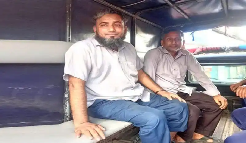 দুই শিক্ষক শোক দিবসের খিচুড়ি খেতে বসে, হাস্যোজ্জ্বল মুখে. Channel i News - চ্যানেল আই নিউজ