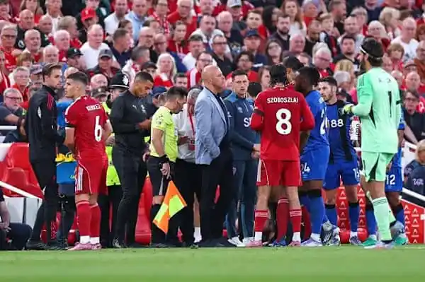 Football players and officials on the field during a match. Channel i News - চ্যানেল আই নিউজ