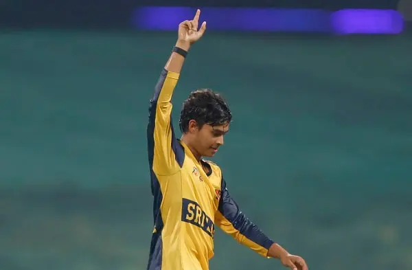 Cricket player celebrating with one finger raised on the field. Channel i News - চ্যানেল আই নিউজ