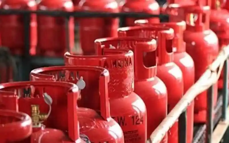 Bangladesh LPG cylinders stacked on shelves in a store. Channel i News - চ্যানেল আই নিউজ