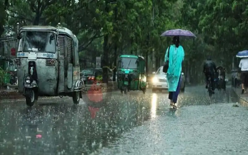 Bangladesh street flooded due to heavy rain, people with umbrellas walking. Channel i News - চ্যানেল আই নিউজ