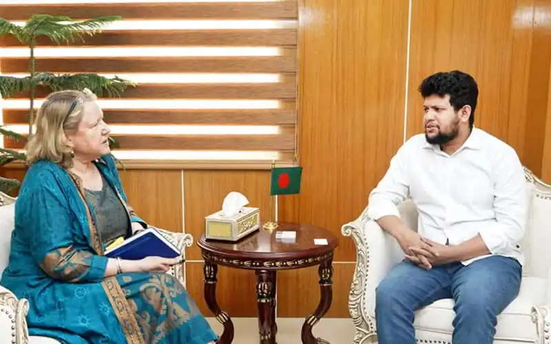 Bangladeshi official and journalist in discussion during interview. Channel i News - চ্যানেল আই নিউজ