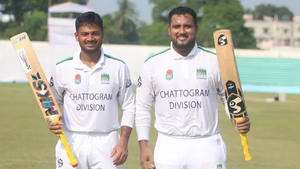 দুটি ক্রিকেটার সেঞ্চুরির পর হাসিমুখে মাঠে দাঁড়িয়ে. Channel i News - চ্যানেল আই নিউজ
