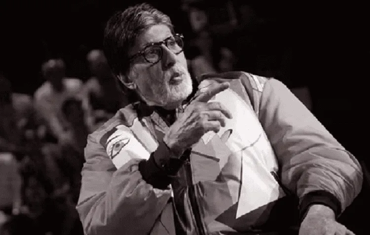 Bengali man with glasses speaking passionately at an event. Channel i News - চ্যানেল আই নিউজ