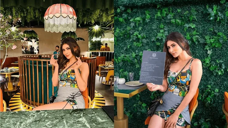 মৌনীর রেস্তোরাঁর পরিবেশে এক তরুণী ছবি তুলছেন. Channel i News - চ্যানেল আই নিউজ