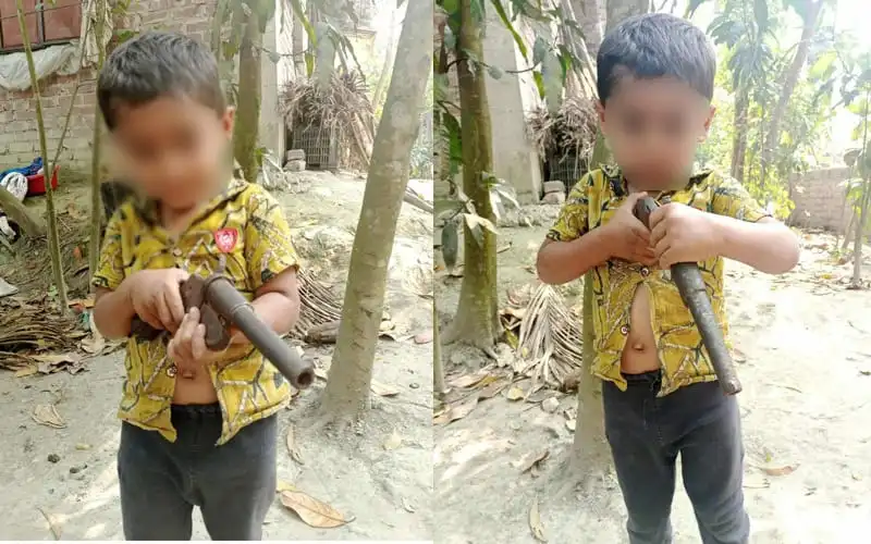 শিশু হাতে আসল বন্দুক নিয়ে খেলছে, এলাকায় চাঞ্চল্য সৃষ্টি. Channel i News - চ্যানেল আই নিউজ