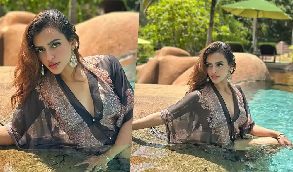 ফারিয়া পানিতে বসে হাসিমুখে ছবি তুলছেন, প্রাকৃতিক পরিবেশে. Channel i News - চ্যানেল আই নিউজ