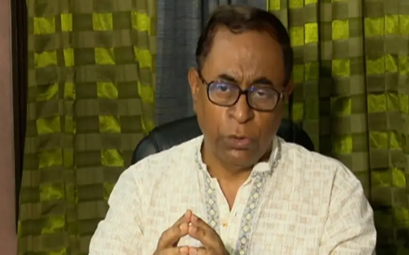 Bangladeshi man in glasses speaking during interview or discussion. Channel i News - চ্যানেল আই নিউজ
