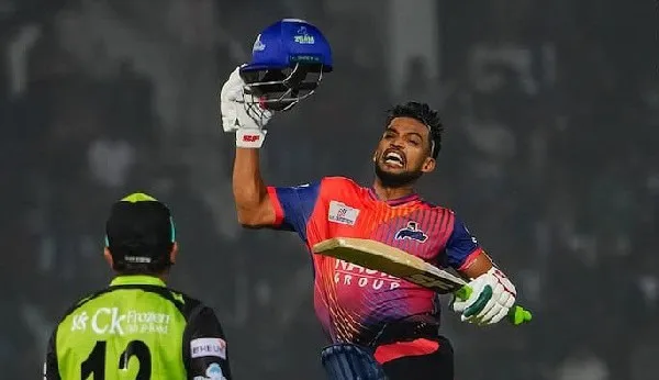 ক্রিকেটার শান্ত হাসিমুখে ট্রফি হাতে উল্লাস করছে. Channel i News - চ্যানেল আই নিউজ