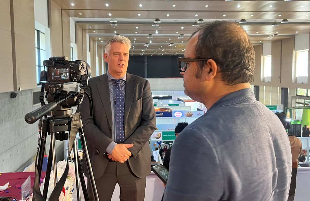 Foreign journalist being interviewed at a conference in Bangladesh. Channel i News - চ্যানেল আই নিউজ