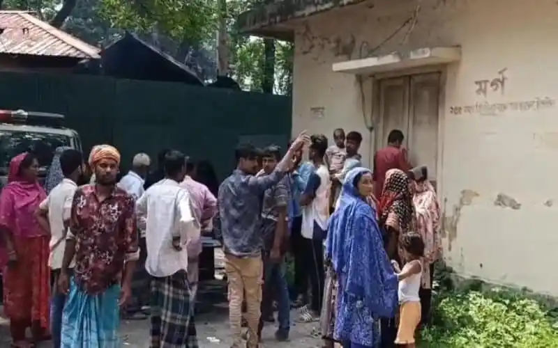 People gather outside a building after a tragic incident in Tangail. Channel i News - চ্যানেল আই নিউজ