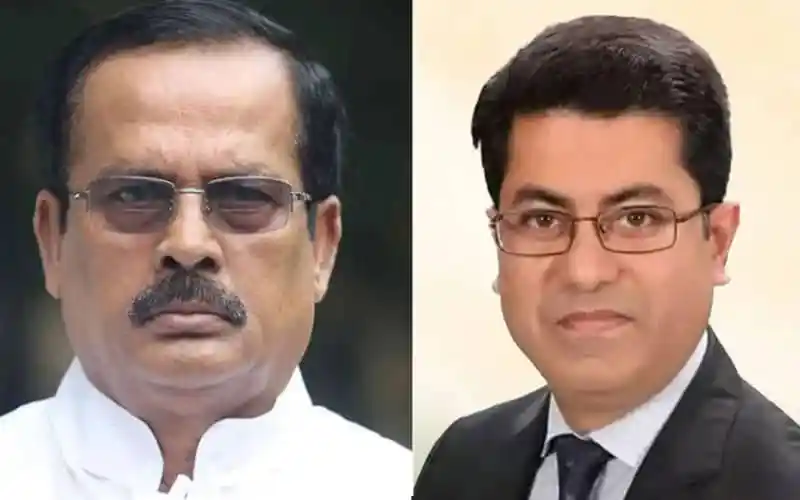 দুইজন রাজনীতিবিদ, একজন পুরুষ, একজন যুবক, উভয়ই পেশাদার পোশাক পরিহিত. Channel i News - চ্যানেল আই নিউজ