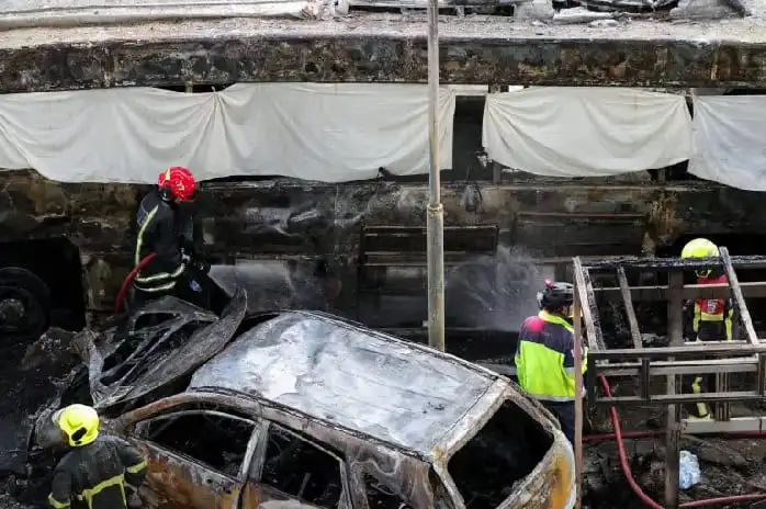 Bangladesh firefighters respond to a severe vehicle fire after a collision. Channel i News - চ্যানেল আই নিউজ