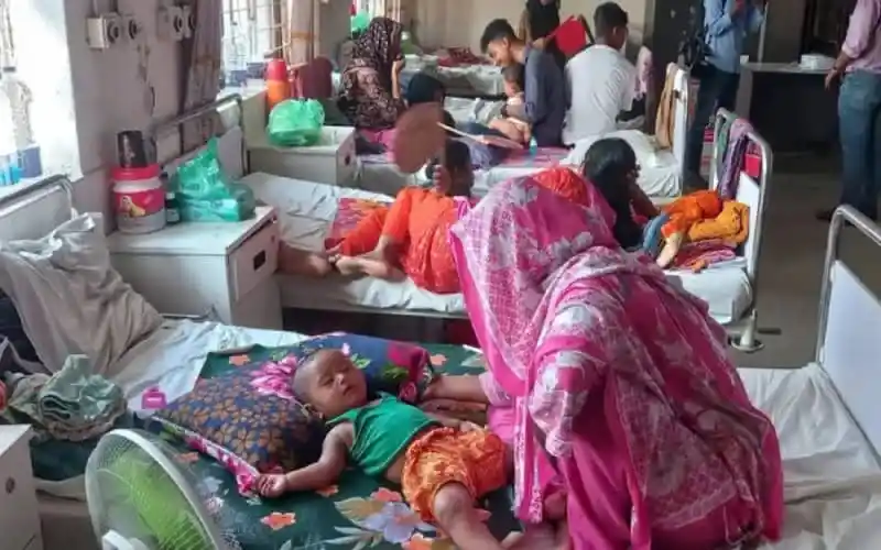 Children and caregivers in a hospital ward with sick children and medical staff. Channel i News - চ্যানেল আই নিউজ