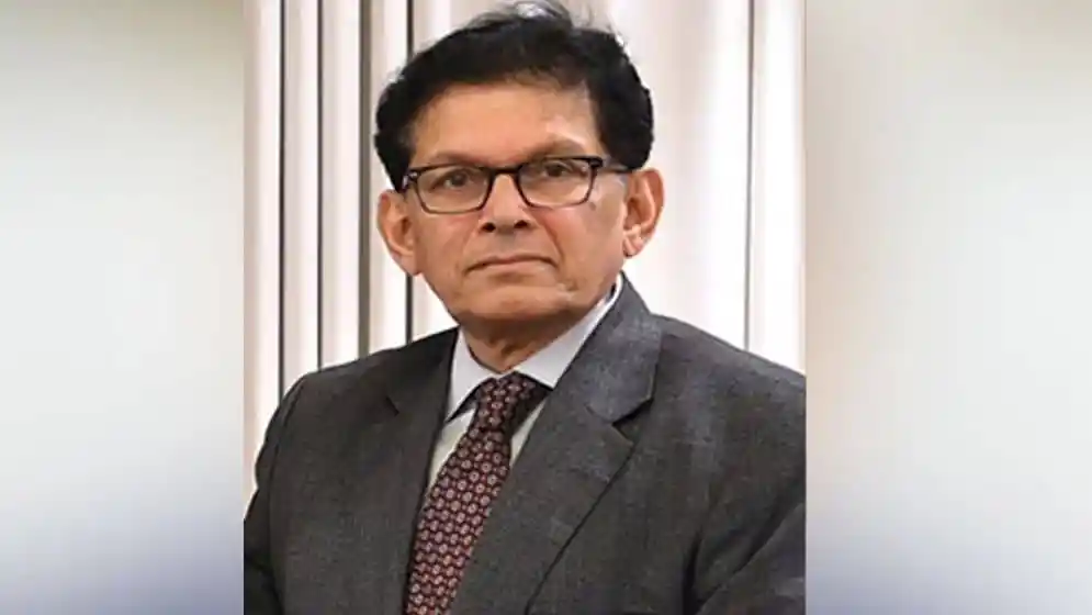 খলিলুর রহমানের পোর্ট্রেট, পেশাদার চেহারা, স্যুট ও টাই পরা. Channel i News - চ্যানেল আই নিউজ