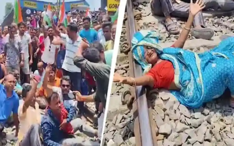 প্রদর্শনকারীরা রেলপথ অবরোধ করে অবৈধ স্থাপনা উচ্ছেদের প্রতিবাদ করছে।. Channel i News - চ্যানেল আই নিউজ