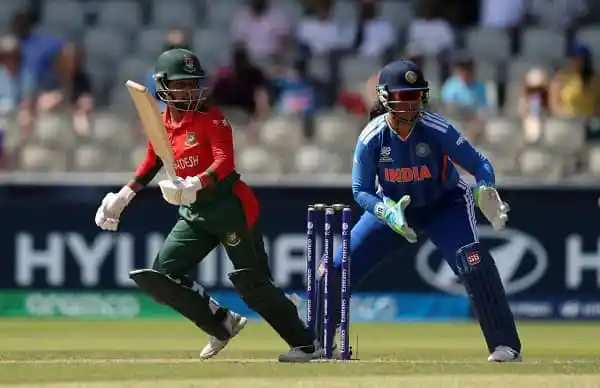 বাংলাদেশ ও ভারতের ক্রিকেটাররা মাঠে ব্যাটিং করছে।. Channel i News - চ্যানেল আই নিউজ