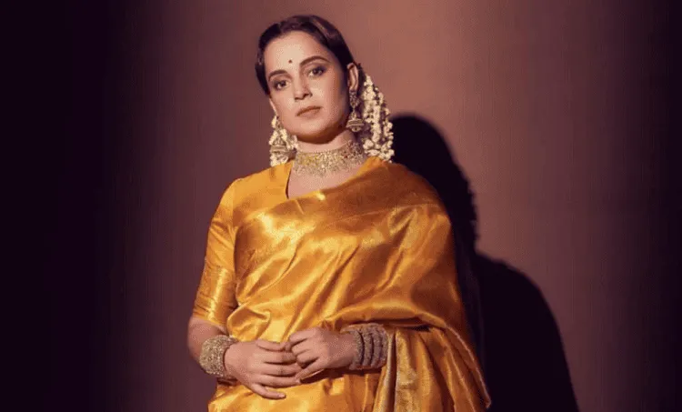 অভিনেত্রী কঙ্গনা রানাউত সোনালী শাড়ি ও গয়না পরিহিত।. Channel i News - চ্যানেল আই নিউজ