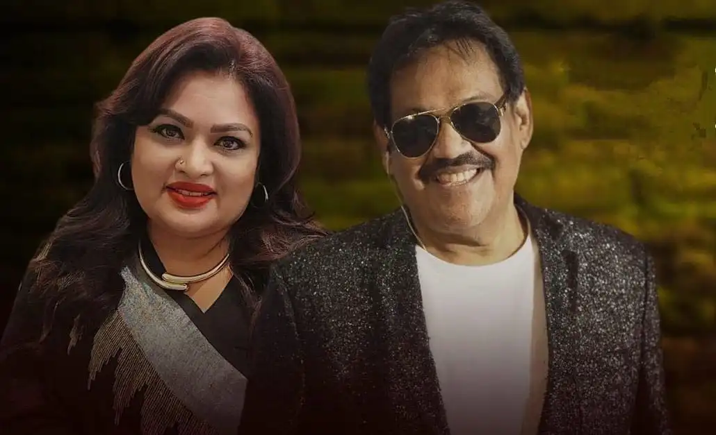 দুটি শিল্পী হাসিমুখে, ব্যাকগ্রাউন্ডে সবুজ গাছের দৃশ্য. Channel i News - চ্যানেল আই নিউজ