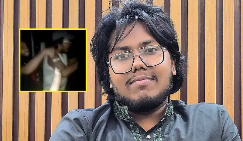ডাকসু নেতা জুবায়েরের ছবি, পেছনে কাঠের দেয়াল, ছোট ইনসেট ভিডিও ক্লিপ. Channel i News - চ্যানেল আই নিউজ