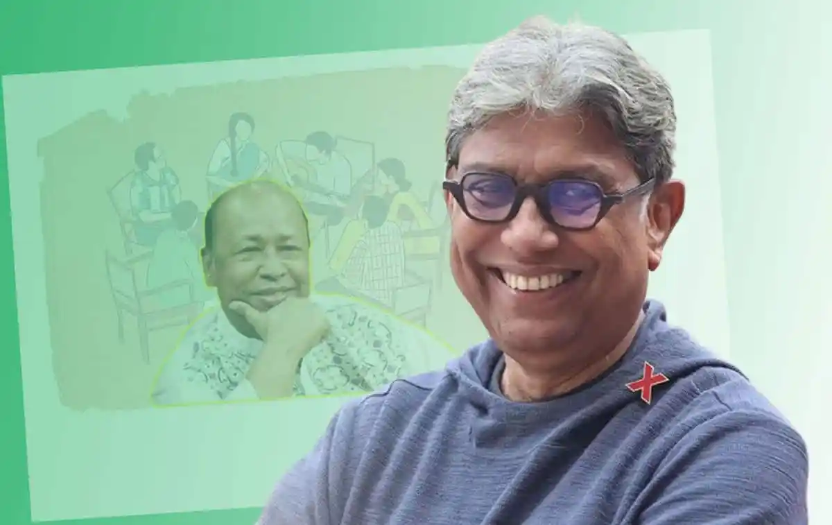 একজন হাস্যোজ্জ্বল ব্যক্তি, পটভূমিতে একটি গ্রাফিক্যাল ছবি. Channel i News - চ্যানেল আই নিউজ