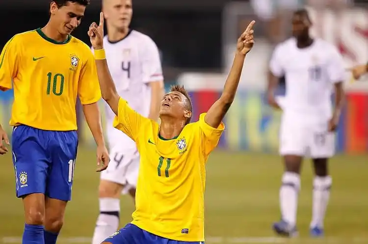 Brazilian footballer celebrating a goal on the field during a match. Channel i News - চ্যানেল আই নিউজ