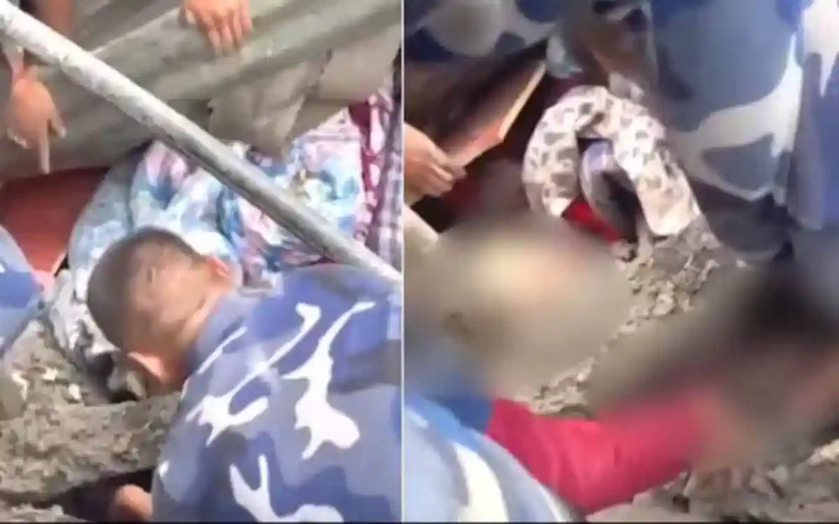 নেপালে ধ্বংসস্তূপের নিচে উদ্ধারকর্মীরা ৬ বছরের শিশুকে জীবিত উদ্ধার করছে।. Channel i News - চ্যানেল আই নিউজ