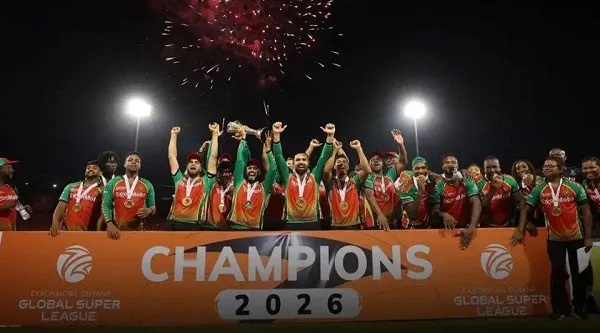 গায়ানা ক্রিকেট দল বিজয় উদযাপন করছে, ট্রফি ও মেডেল সহ. Channel i News - চ্যানেল আই নিউজ