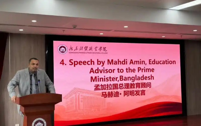 Mahdi Amin delivering speech at an event in Bangladesh. Channel i News - চ্যানেল আই নিউজ