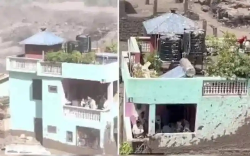 নেপালের বন্যার কারণে বাড়ির নিচে পানি ও ধ্বংসাবশেষ পড়ে গেছে।. Channel i News - চ্যানেল আই নিউজ